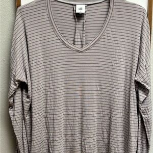 Cabi long sleeve top. Very soft and comfy. Grey with purple strips.